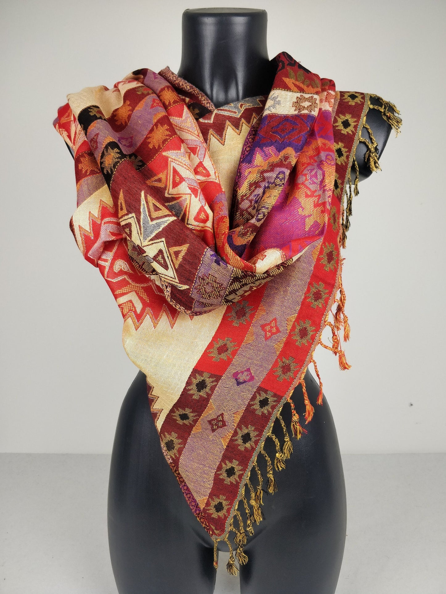 Pashmina Arsena réversible en viscose. Echarpe aux motifs géométriques de style inca multicolore.